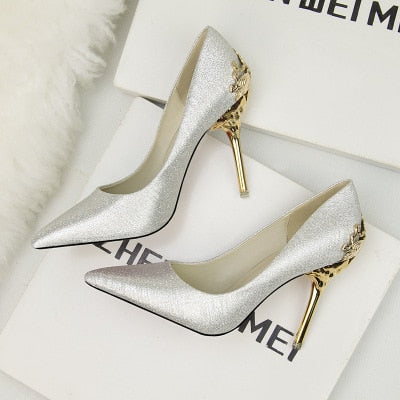 Korean version of the pointed single shoes red bride shoes metal hollow suede stiletto heels explosion promotion