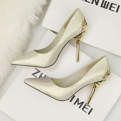 Korean version of the pointed single shoes red bride shoes metal hollow suede stiletto heels explosion promotion